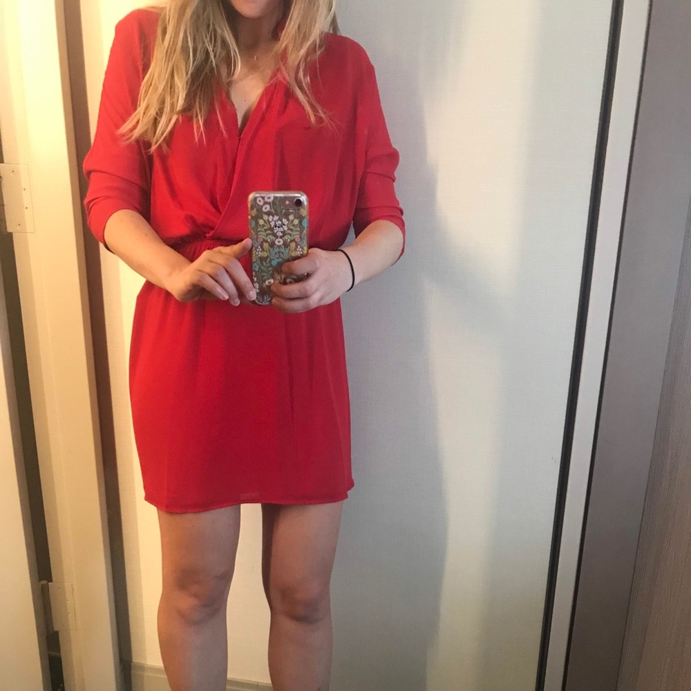 Red snap front dress with 3/4 length sleeves